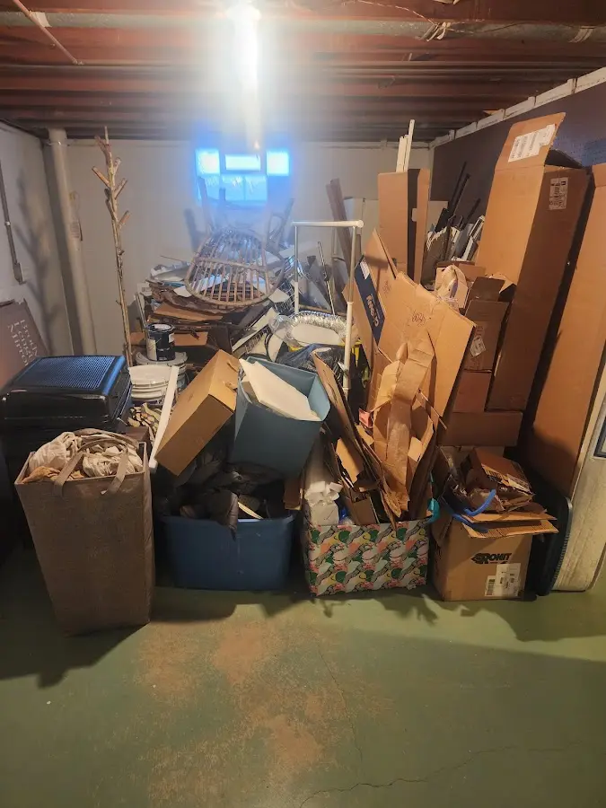 Roll-off dumpster container at job site for 2 Yard Dumpster Rental in Cottleville